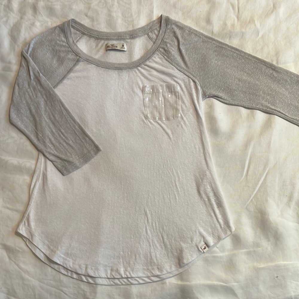 Hollister womens tee, sz. M. White with gray raglan 3/4 sleeves, sequined pocket